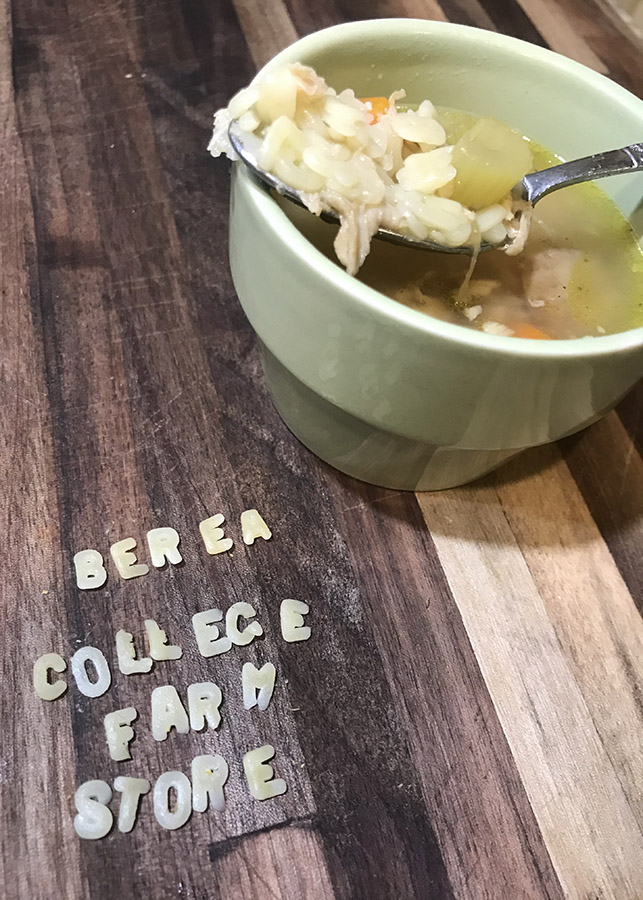 Chicken noodle soup with "Berea College Farm Store" in alphabet noodles